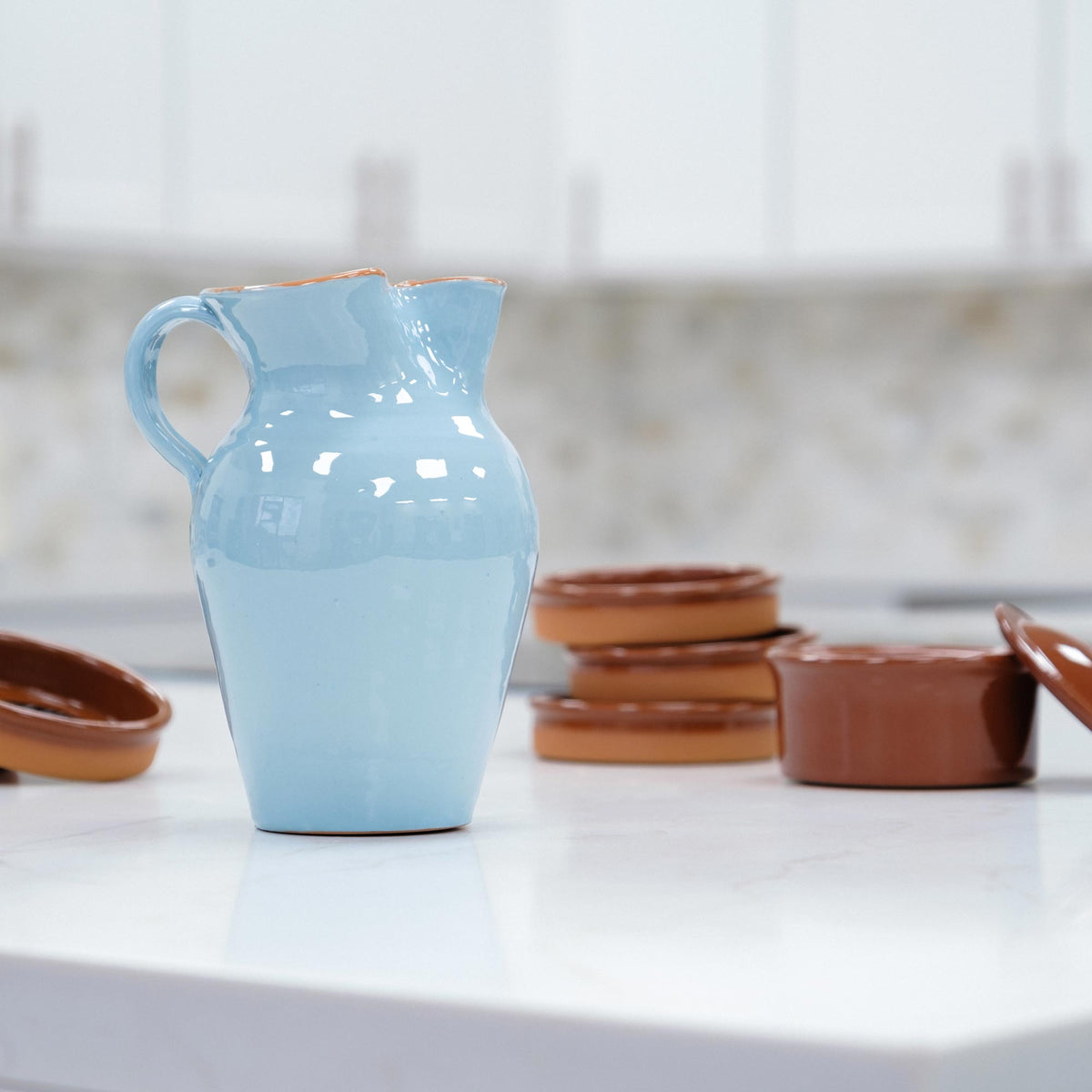 https://www.terramarimports.com/cdn/shop/products/Terracotta-Sangria-jar-Light-Blue2-S-6515-1Lt_1200x1200.jpg?v=1665524710